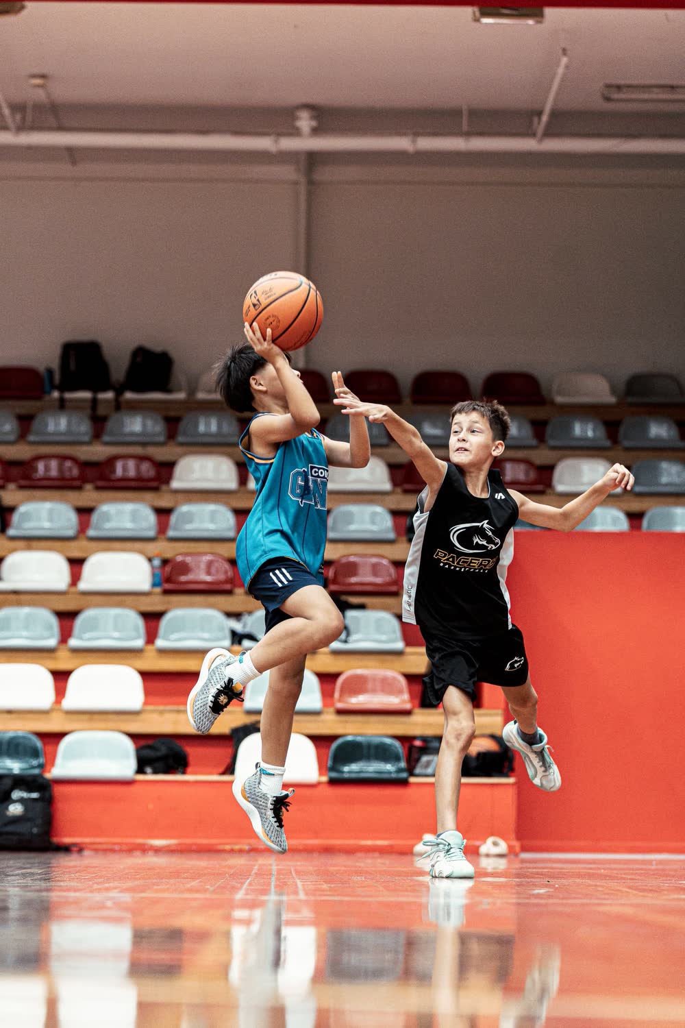 Player rising for a shot over a defender