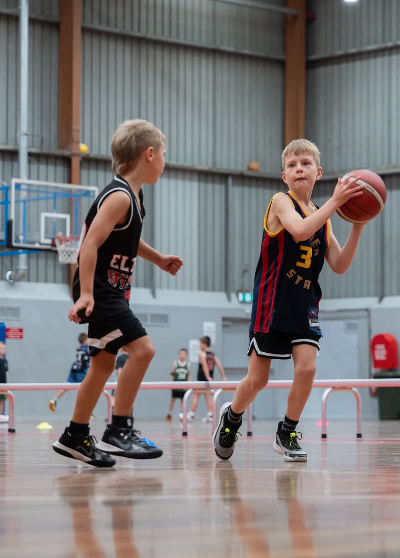 Junior player holding a ball at an Early Edge session
